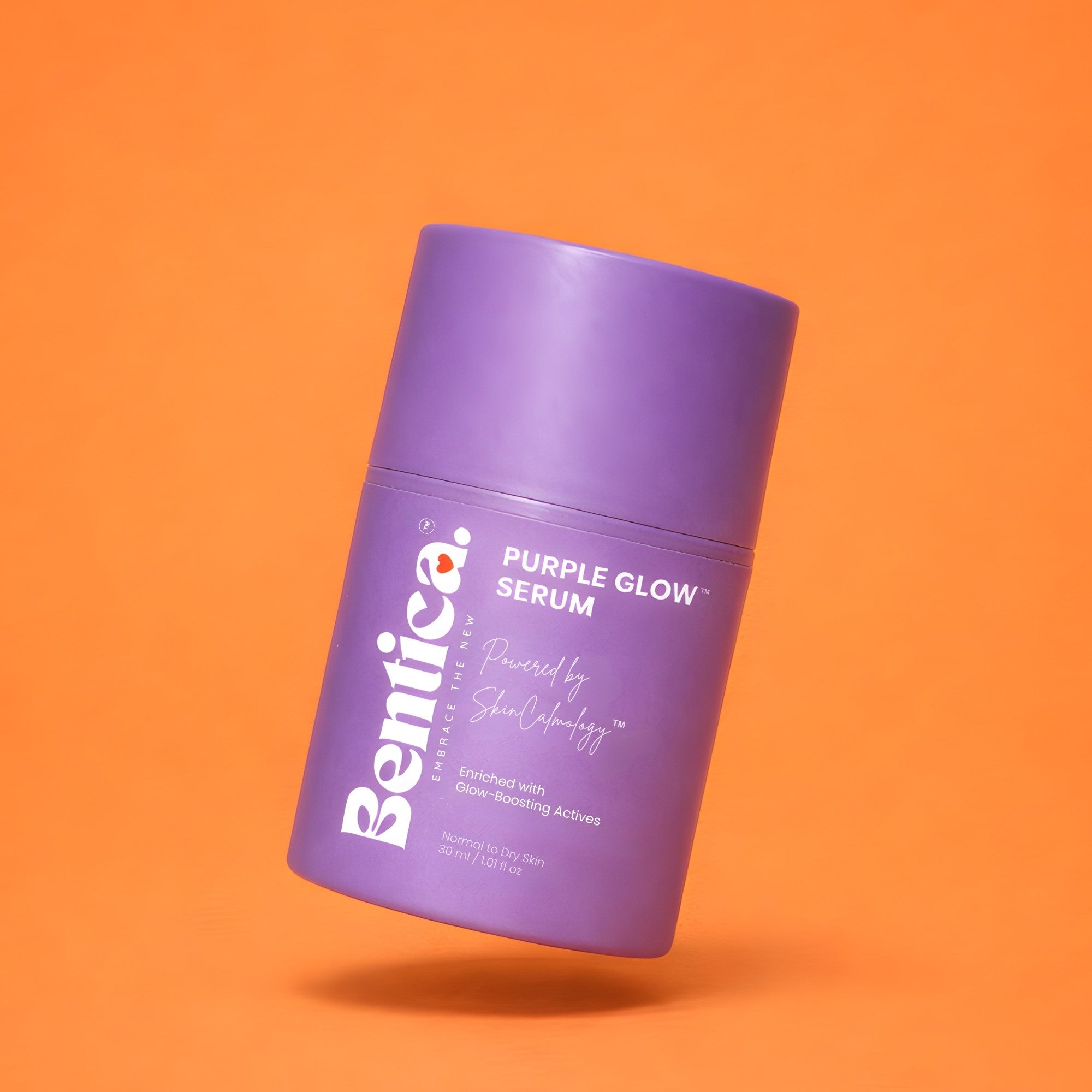 Purple serum bottle labeled 'Bentica Purple Glow Serum' on an orange background